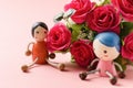 Red roses and doll Royalty Free Stock Photo