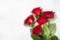 Red roses flower bouquet on white background top view. Royalty Free Stock Photo