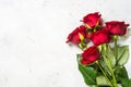 Red roses flower bouquet on white background top view. Royalty Free Stock Photo