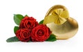 Red roses and golden gift box in heart shape Royalty Free Stock Photo