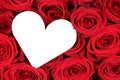 Red roses with heart as symbol of love on Valentine's day Royalty Free Stock Photo