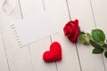 Red roses and heart with a blank note Royalty Free Stock Photo