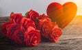 Red Roses with hearts on old wooden board, Valentines Day Royalty Free Stock Photo