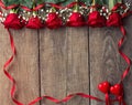 Red roses with ribbon frame and two hearts Royalty Free Stock Photo