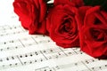 Red Roses on Sheet Music