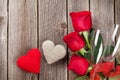 Red roses and Valentine`s day hearts Royalty Free Stock Photo