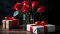 Red roses in a vase and white gift boxes on a dark surface Royalty Free Stock Photo