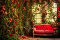 Red roses in vintage room with old sofa and window, vintage style