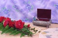 Red Roses with Wedding Bands and Jewelry Box Royalty Free Stock Photo