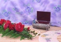 Red Roses with Wedding Bands and Jewelry Box Royalty Free Stock Photo