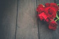 Red roses on wood background,Retro vintage Royalty Free Stock Photo