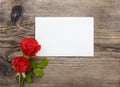 Red roses on wooden background Royalty Free Stock Photo