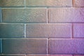 Pastel colored brick texture closeup horizontal background.