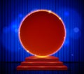Red round banner on scene with stage podium and blue curtain Royalty Free Stock Photo