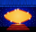 Red round banner on scene with stage podium and blue curtain Royalty Free Stock Photo