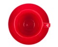 Red round empty tea cup on a saucer Royalty Free Stock Photo