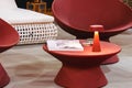 Red round plastic table with lamp Royalty Free Stock Photo
