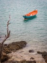 Red rowing boat on a beach Royalty Free Stock Photo