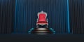 Red royal chair on a background of black curtains. Royalty Free Stock Photo