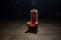 Red royal chair miniature on wooden table. Place for the king. Medieval Throne Royalty Free Stock Photo