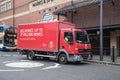 Red Royal Mail postal service truck van delivery on road Royalty Free Stock Photo