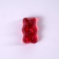 Red rubber bear on a white background Royalty Free Stock Photo