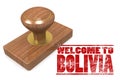 Red rubber stamp with welcome to Bolivia