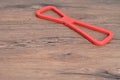 A red rubber tug of war toy for a dog Royalty Free Stock Photo