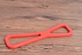 A red rubber tug of war toy for a dog Royalty Free Stock Photo