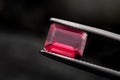 Red ruby gemstone with dark rock Royalty Free Stock Photo