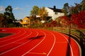 Red running track and sports stadium, Norway Royalty Free Stock Photo