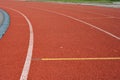 Red running track in stadium as a concept sport life Royalty Free Stock Photo