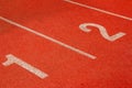 Red running track Synthetic rubber on the athletic stadium Royalty Free Stock Photo