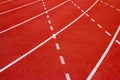 Red running track Synthetic rubber on the athletic stadium. Royalty Free Stock Photo