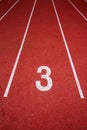 Red running track Synthetic rubber on the athletic stadium. Royalty Free Stock Photo
