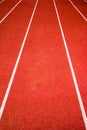 Red running track Synthetic rubber on the athletic stadium. Royalty Free Stock Photo