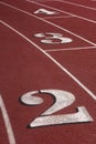 Red running tracks with white lines Royalty Free Stock Photo