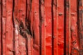 Red rusty container with blows Royalty Free Stock Photo