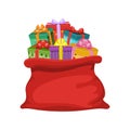 Red sack of Santa Claus full of gifts. Royalty Free Stock Photo