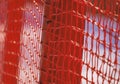 Red safety net at the edge of an alpine skiing slope Royalty Free Stock Photo