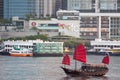 Red sail Chinese junk boat at Victoria Harbour, Hong Kong Royalty Free Stock Photo