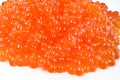 Red salmon caviar heap isolated on white Royalty Free Stock Photo