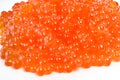 Red salmon caviar heap isolated on white Royalty Free Stock Photo