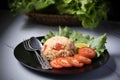 Red salted egg fried rice with vegetables in black plate Royalty Free Stock Photo