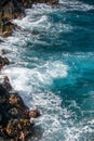 Red Sand Beach, Maui in in Hawaiian. Sea Wave and rock, summer beach background. Royalty Free Stock Photo