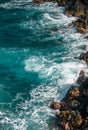 Red Sand Beach, Maui in in Hawaiian. Sea Wave and rock, summer beach background. Royalty Free Stock Photo