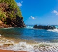 Red Sand And Blue Waves of Kaihalulu Beach