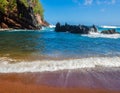 Red Sand And Blue Waves of Kaihalulu Beach