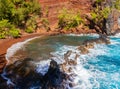 Red Sand And Blue Waves of Kaihalulu Beach,