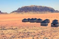 Red sand desert and Bedouin camp at sunny summer day in Wadi Rum, Jordan. Middle East Royalty Free Stock Photo